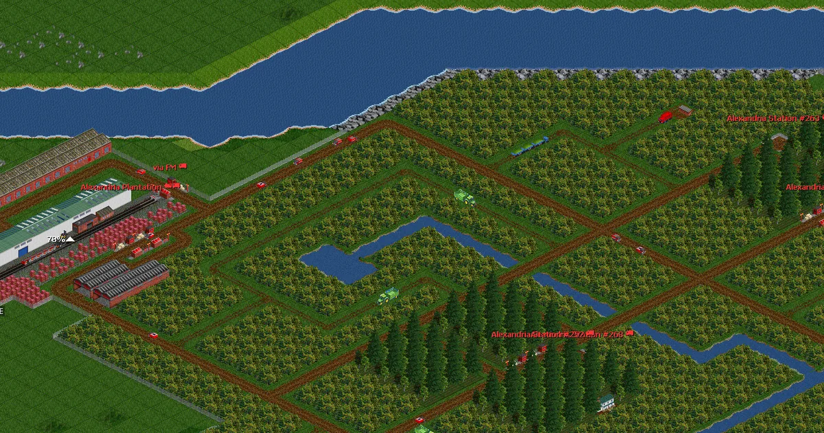 محطة قطار ومزارع وطرق في خريطة شبكة نقل داخل لعبة OpenTTD